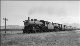 NP Train No. 4 east of Livingston with NP 2180, Class Q-4, and NP 1912, Class W-2 locomotives.