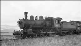 WSS&YP No. 42, 4-4-0, ex. MILW 42, ex. CMSP&P 904, a Rogers built number plate 6232 locomotive pulling freight between Ringling and White Sulfur Springs, MT. 