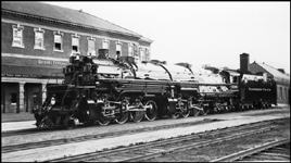 NP 5006, Class Z-5 waits in front of Livingston Depot while crew signs train register.