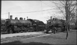 Two Pacifics, a Q-4 and a Q-1 are between jobs at Livingston Passenger station.  2180 is a 1909 Baldwin.  2119 is a 1906 Alco.