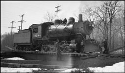 The class S-10 328 was part of a group of locomotives built for another railroad, and purchased by NP when that railroad defaulted on the order.  The 328 was saved after dieselization, and for many years pulled excursion trains in northern Minnesota.  In 2006 it may be found in the Jackson Street Roundhouse in Minneapolis awaiting rebuilding.  It has just pulled a mixed train to the end of the Taylors Falls branch line, and is being turned on the 