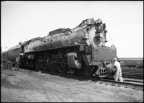 UP engine 824, class FEF-3 4-8-4, on first no. 3, westbound Utahn, at Laramie, WY.