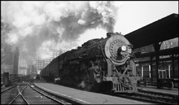 NYC engine 5448 at head of passenger train, La Salle St. Station, Chicago.