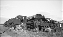Scrapped Spokane International Railroad steam locomotives at Spokane, WA.