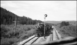 A Diesel cab view from Train No. 3 of NP 1387, a 4-6-0 10-Wheeler Class S-4, with a work train at Sampson, MT.