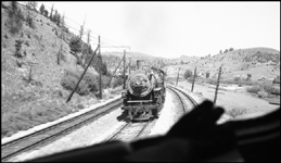 A Diesel cab view from Train No. 3 of NP 1818, a 2-8-2 Mikado Class W-3, west bound near Bearmouth, MT.