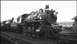 NP 1354, a 4-6-0 10-Wheeler Class S-4 Baldwin at the head of a string of steam locomotives fresh out of the shops at Livingston, MT.