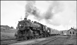 UP 3226 with Train No. 67 makes a station stop at Mica, WA.