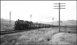 NP 1811 Class W-3, 2-8-2, with three diesel helpers Train #1, NCL, between Missoula and DeSmet, MT.