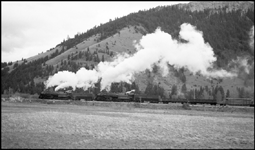 NP 5100, Class Z-6, 4-6-6-4, and NP 5120 Class Z-6 East bound near Bearmouth, MT.