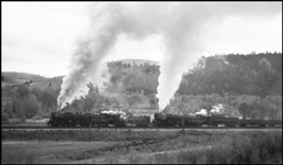 NP 5100, Class Z-6, 4-6-6-4, and NP 5120 Class Z-6 East bound near Bearmouth, MT.