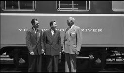 Unknown person with R. S. Macfarlane and Gov. J. Hugo Aronson at dedication of NP 1382 at Helena, MT.
