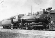 NP 276, Class P locomotive with Engineer holding oil can