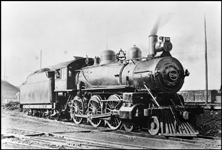 NP 214, Class P-1 locomotive at Spokane, with engineer at his controls.