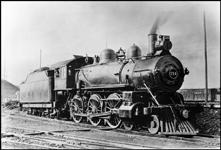 NP 214, Class P-1 locomotive at Spokane, with engineer at his controls.