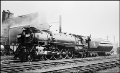 CO 4-8-2 Mountain no. 544, with George Washington herald, in yard at Washington, DC. Coal dock in back.
