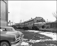 NP 6700 , F9 passenger diesel electric locomotive 3 unit consist.  Location for picture is not provided but it appears it is at Mississippi Street diesel shop.