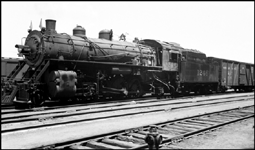 MP light 2-8-2 Mikado no. 1246 on freight in yard at Jefferson City, MO.