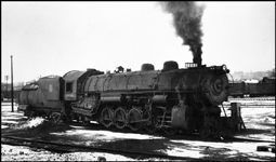 Fired up, but going nowhere until someone remocves that blue flag, a 2-10-2 is one of the few creatures stirring on a depression winter day.  This is a 1918 Baldwin built for affiliate Los Angeles & Salt Lake.