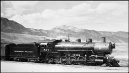 NP # 1529, Class W, serial Number 10775, pulling passenger train at Gardiner, MT.