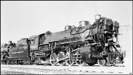 Shiny NP Class W-5 2-8-2 Mikado 1844 runs as a headend helper at Muir, MT.