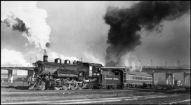 NP Train No. 2/1 with NP 1546, Class W passing under 7th Street Bridge in St Paul, on arriving at St Paul Union Station 