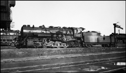 Duluth, Missabe and Iron Range Railway #90 in the service area at Proctor, Minnesota.