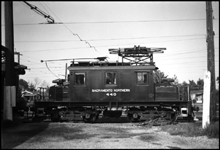 A steeple cab freight motor at rest in a yard on one of the bigger western interurbans.  The Sacramento Northern was a freight carrier, with some passnger business, running from the San Francisco bay area north and east to Chico.