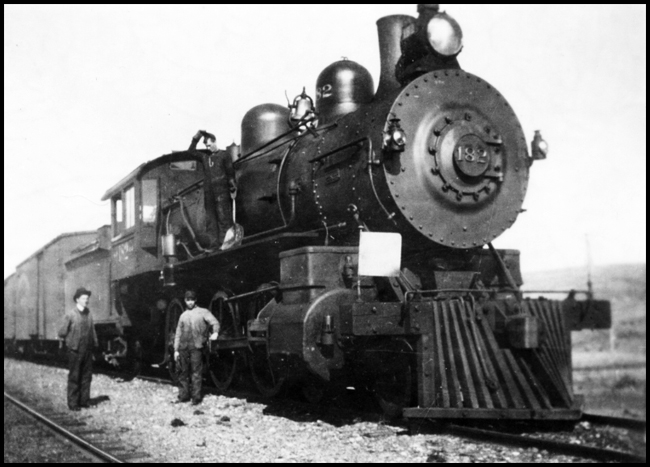 NP 182, a 4-6-0 10-Wheeler Class Rc, at the head of an extra freight train in Hoyt, Montana.