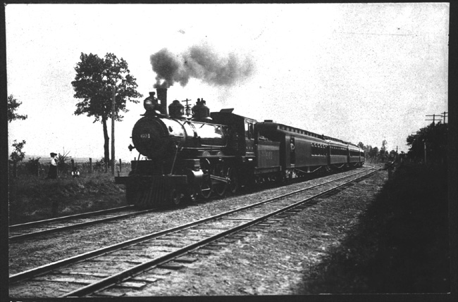 NP 601, Class N, Atlantic type pulling passenger train with onlookers on left, former number 81