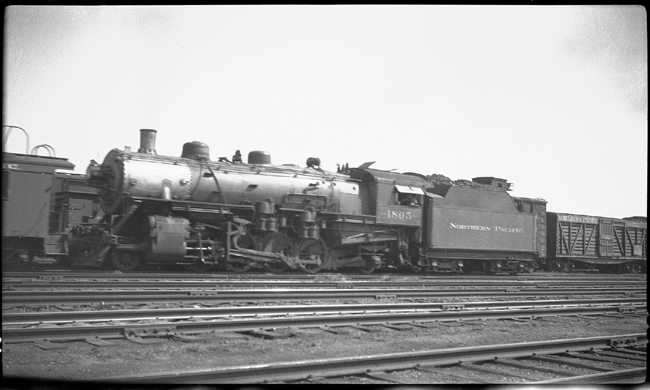 NP 1805, Class W-3 on train in freight yard at Jamestown, ND