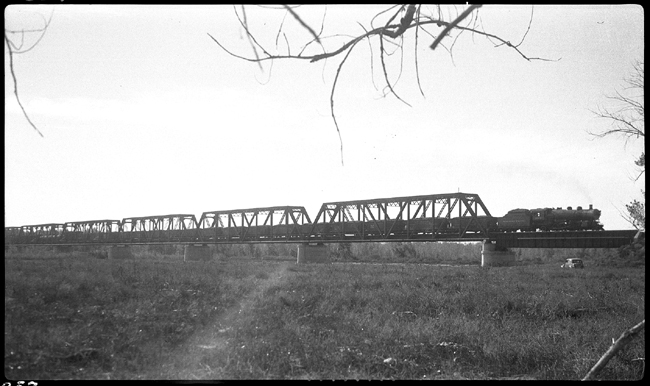 NP 1905, Class W-2 with train 643 on Yellowstone River bridge at Glendive, same as RVN00856 from a distance 