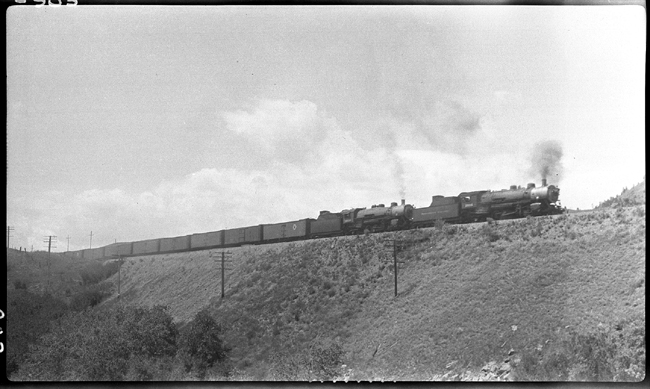 NP 1815, Class W-3 and NP 1809, Class W-3 doubling heading on X1815E coming off Bozeman hill approaching Livingston