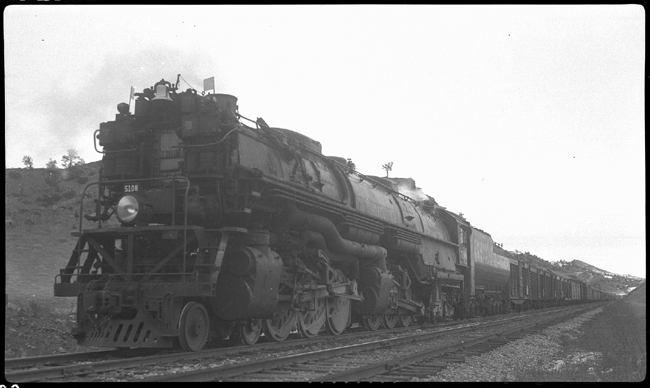 NP 5108, Class Z-6 stalled on 1.8% grade of Bozeman Hill, west of Livingston, with 135 cars on X5108W. Stall was due to strong winds