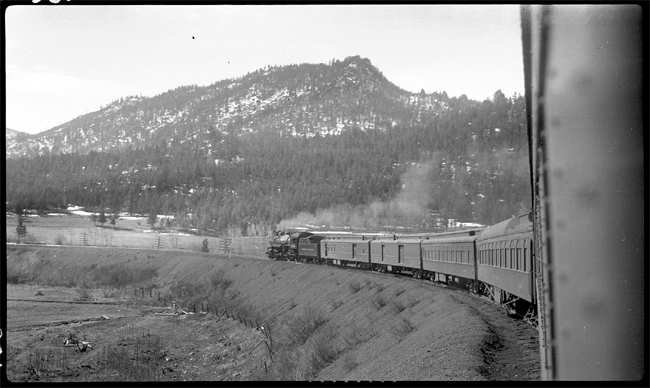 NP 2238, Class Q-5 pulling train No. 4 arriving Austin, MT.  Photograph is taken from rear of train. Duplicate of RVN00980.