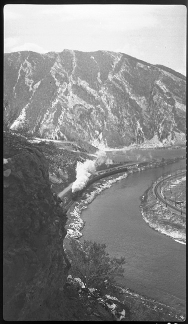 Distant view of Train No. 1 , Jefferson Canyon, Jefferson River, between Whitehall and Three Forks, MT
