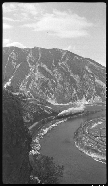 Further away than previous view (RVN01032) of Train No. 1 , Jefferson Canyon, Jefferson River, between Whitehall and Three Forks, MT