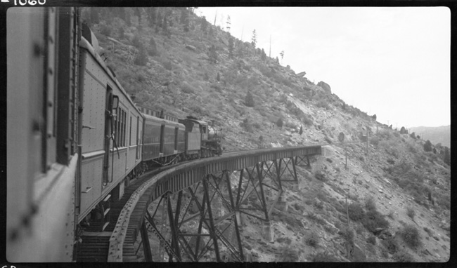 NP 1525, Class W pulling Train No. 236 on trestle near Skones, on Butte Mountain.  Photo is taken from onboard train.