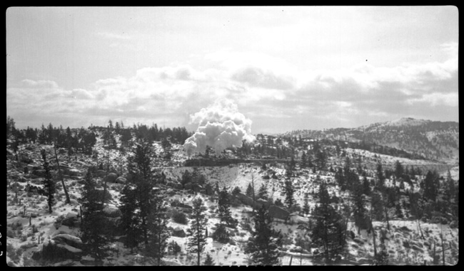 NP 1761, Class W-3 and NP 2605, Class A doubleheading with train No.1 approaching Spire Rock on Butte Mountain 