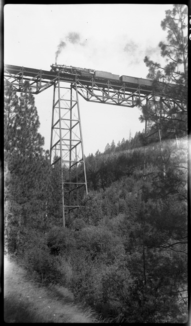NP 2611, Class A pulling Train No. 1 across Marent Trestle