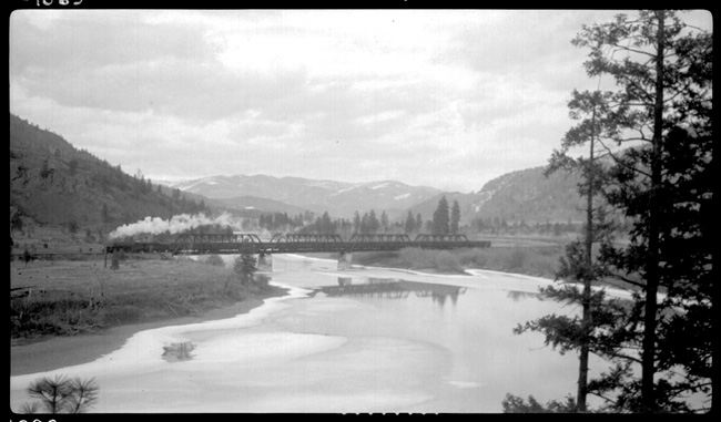 NP 2611, Class A with Train No. 1 crossing Flathead River Bridge between Perma and Paradise, MT.