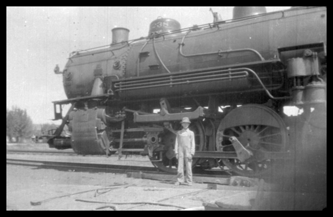 Left side of NP 2238, Class Q-5 at Whitehall after being rerailed at the Blackstone, MT derailment of Train No. 41 where derailment was caused by switch being opened by 11 year old boy.