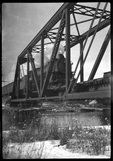 NP Train No. 236 passing over bridge over the Madison river at Three Forks, MT