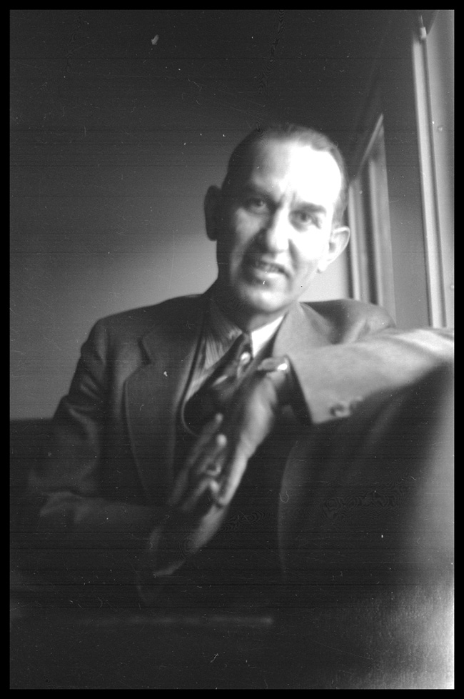 D. G. Peckenbaugh, Opr., at Spokane Relay Office.  Photograph taken on Train No. 4.