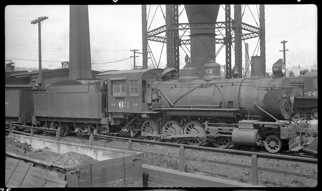 NP 63, Class F-1 on service track at Tacoma under water tower.