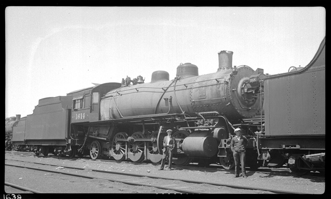 NP1614, Class W, Mikado in Livingston, with HLJ and another unidentified person in foreground. 