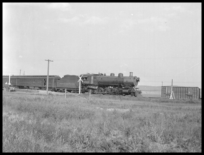 NP 1594, Class W on passenger train at Three Forks, MT.