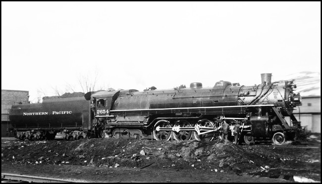 Shop men working on NP 2654, Class A-2 at Missoula.