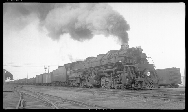 NP 5002, Class Z-5 on X5002E leaving Beach, ND.  Engr. Noark