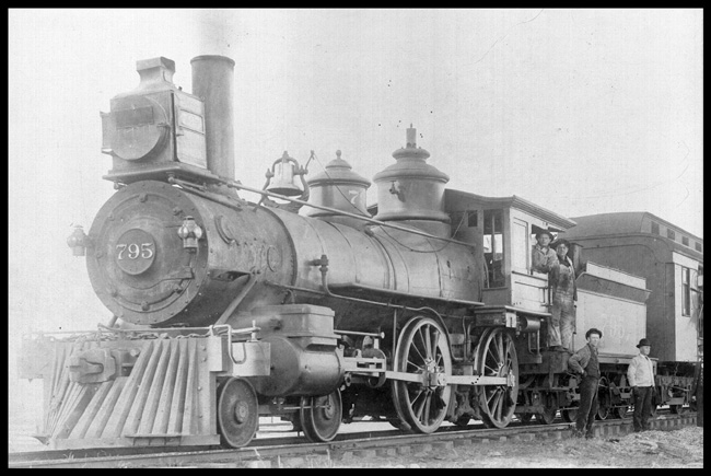 NP 795, Class C-6 American style Locomotive made by Portland at Ocosta, WA.  Former number 357.  Crew poses for picture.